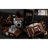 Collection of Three Vintage Cameras, com