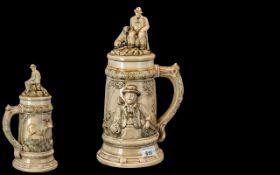 19th Century Stein depicting the body with raised hunter with deer and floral decoration,