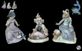 Collection of Three Nao figures, comprising a young girl with a dog, 7" tall,