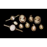 A Collection of Nine Pieces of 9ct Gold Mounted Cameo Jewellery, to include six pendants,