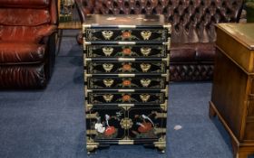 A Chinese Black Lacquered Cabinet with five long drawers above storage base, decorated throughout,