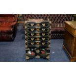 A Chinese Black Lacquered Cabinet with five long drawers above storage base, decorated throughout,