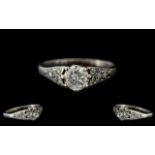 A Single Stone Diamond Ring, set with a round modern brilliant cut diamond, est. weight .60 pts.