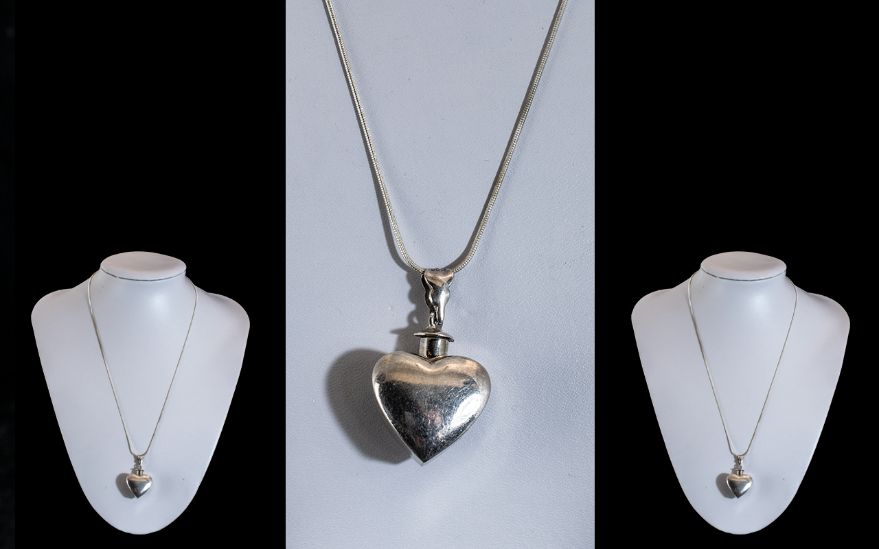 Silver Scent Bottle In The Shape of a Heart, Suspended on a Silver Necklace.