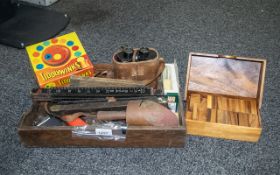 A Wooden Tray Containing Mixed Collectables to include two folding measures, an old tape measure,