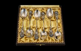 1930's Boxed Set of Six Floral Topped Silver Teaspoons. Marked Sterling Silver to Each Spoon.