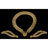 Ladies - Attractive 9ct Gold Panther Design Bracelet with Heart Shaped Padlock and Safety Chain.