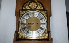 Arts & Crafts Oak Cased Long Case Clock, silver chapter dial with gilt spandrels,