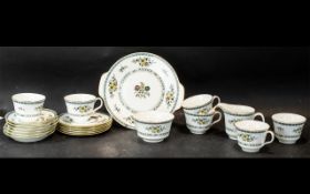 A Minton Tea Service 'Avignon', comprising six cups, saucers and side plates, milk jug,