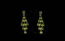 Peridot Five Row Kite Shaped Drop Earrings, of 9cts; each earring with the brilliant, sparkling