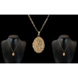 9ct Gold Oval Shaped Hinged Locket with Exquisite Embossed Decoration to Front Cover of Locket,