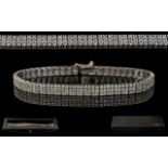 18ct White Gold Attractive and Superior Quality Diamond Set Bracelet. Marked 18ct.