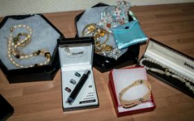 Collection of Costume Jewellery, to include gold tone necklace in box, fashion lighter,