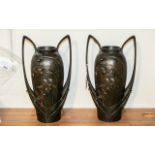 A Pair of French Art Nouveau Style Twin Handled Vases raised floral decoration to both front and