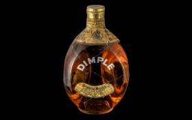 Dimple Scots Old Blended Scotch Whisky by John Haig & Co Ltd, Scotland. 70% proof.