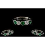 18ct White Gold - Exquisite and Top Quality - Five Stone Emerald and Diamond Set Dress Ring.