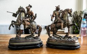 Pair of Spelter Figures, Horses and Riders Jousting. Green and copper tone patinations.