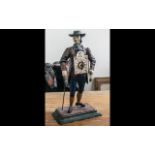 Vintage JVE Dutch Cast Iron Figure Clock Seller 'Man of the Time' Measures 15" tall.