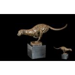 A Contemporary Bronze Cased Sculpture of a Running Leopard In Full Flow,