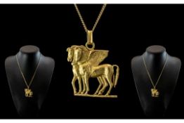 18ct Gold Designer Pendant In The Form Of Pegasus 45 x 37mm Suspended On A 18ct Gold Chain.