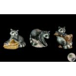 Royal Copenhagen Trio of Hand Painted Porcelain Figures. Comprises 1/ Raccoon - Climbing on a