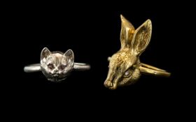 Two Silver Rings, one silver gilt in the form of a rabbit's head, the other in the form of a cat.