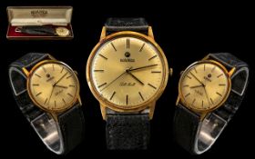 Gents 14ct Gold Roamer Pall Mall Wristwatch gilt dial baton numerals with centre seconds.