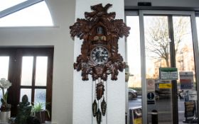 A Large Kaiser Musical Cuckoo Clock of typical design and form. Overall height 44 inches.