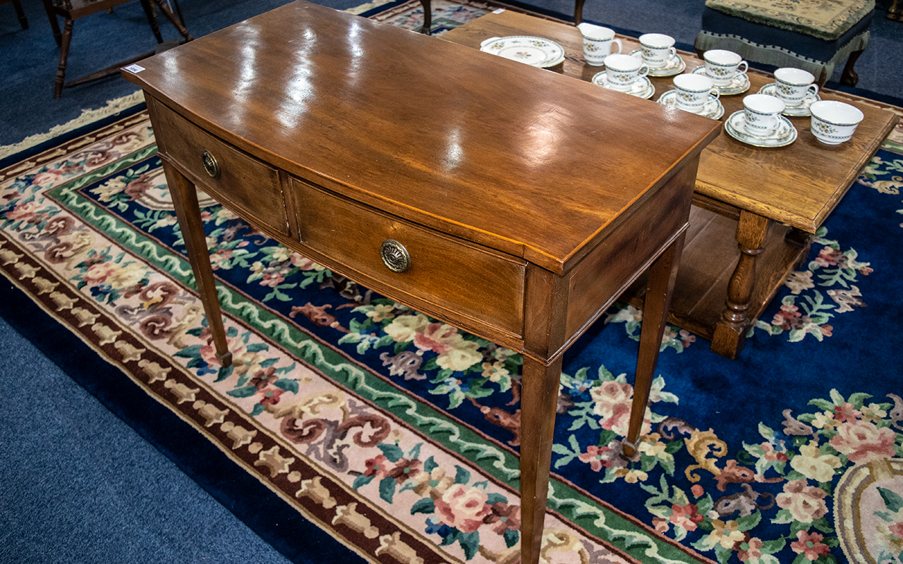 A Mahogany Slight Bow Fronted Side Table, two frieze drawers, raised on tapering legs. - Image 2 of 2