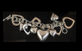 Silver Large Designer Statement Piece and Chunky Heart Shaped Bracelet.