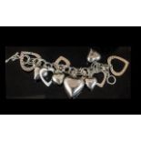 Silver Large Designer Statement Piece and Chunky Heart Shaped Bracelet.