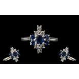 18ct White Gold - Superb Quality Diamond and Sapphire Set Ladies Dress Ring of Pleasing Design.