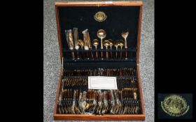 Boxed Canteen of Cutlery 'Bronzeware' with wooden handles, including carvers,