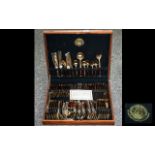 Boxed Canteen of Cutlery 'Bronzeware' with wooden handles, including carvers,