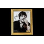 Beatles Interest - Signed Photograph of Paul McCartney, framed behind glass,