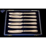 A Boxed Set of Six Sterling Silver Butter Knives. Both Blade and Handle Hallmarked for Silver.