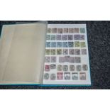 Small stock book of Vatican City stamps.