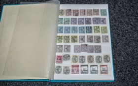 Small stock book of Vatican City stamps.