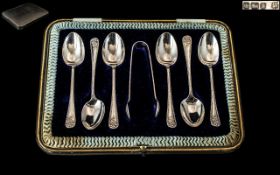 Edwardian Period 1902 - 1910 - A Boxed Set of Six Sterling Silver Teaspoons and Matching Sugar Nips.