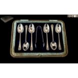 Edwardian Period 1902 - 1910 - A Boxed Set of Six Sterling Silver Teaspoons and Matching Sugar Nips.