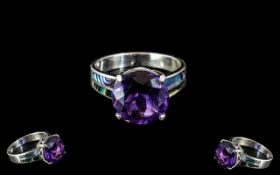 Amethyst Solitaire Style Ring, a round cut amethyst, of 6.