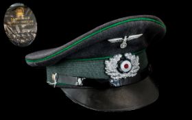 Replica WWII German Peaked Cap, with cap badges.