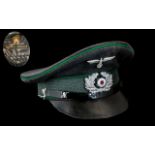 Replica WWII German Peaked Cap, with cap badges.