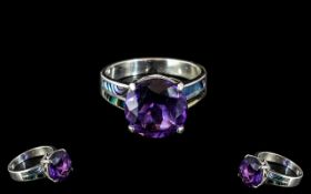 Amethyst Solitaire Style Ring, a round c