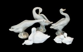 Collection of Three Lladro Geese Figures, comprising one honking,