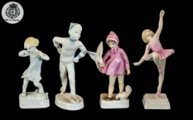 Royal Worcester - A Fine Collection of 4 Small Hand Painted Figures.