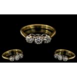 18ct Gold 3 Stone Diamond Ring set with round modern brilliant cut diamonds,