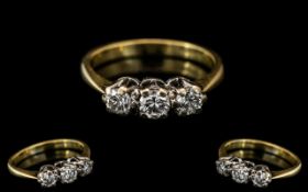 18ct Gold 3 Stone Diamond Ring set with round modern brilliant cut diamonds,