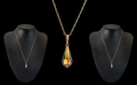 9ct Gold Mystic Topaz Pendant Suspended on 9ct Gold Chain.