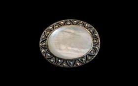 Antique Marcasite and Large Mother of Pearl Centre Stone.